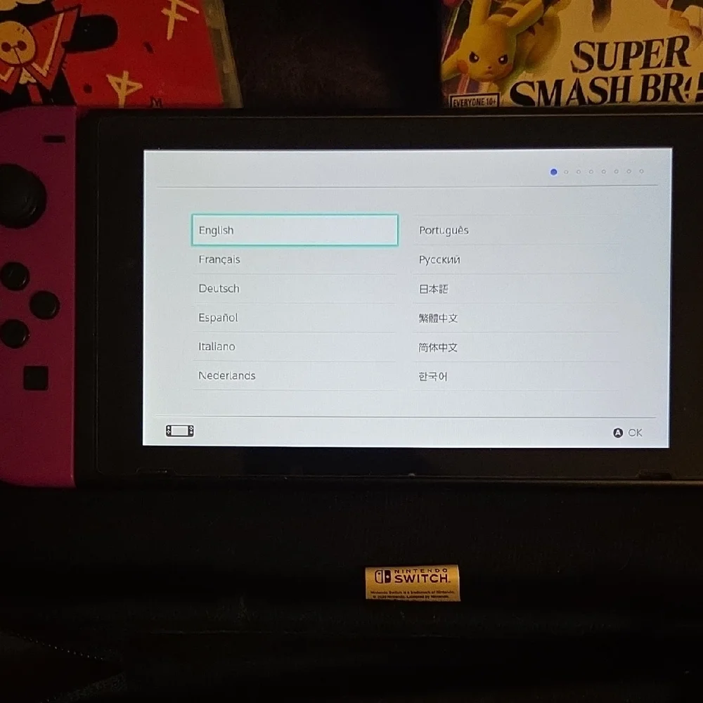 Nintendo Switch Console with Purple and Orange Joy-Con